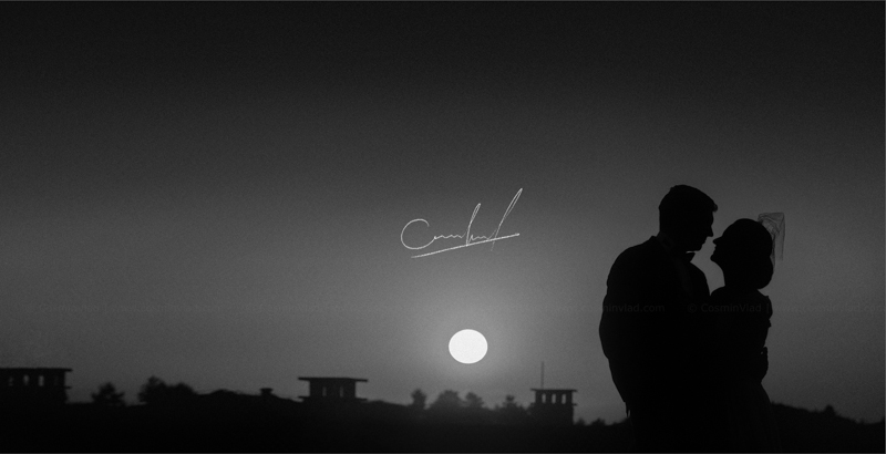 Full moon silhouette of bride and groom